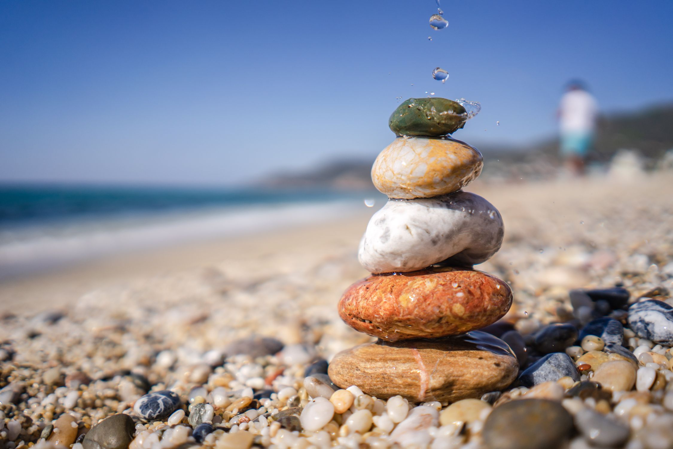 Shallow Focus Photo of a Cairn · Free Stock Photo