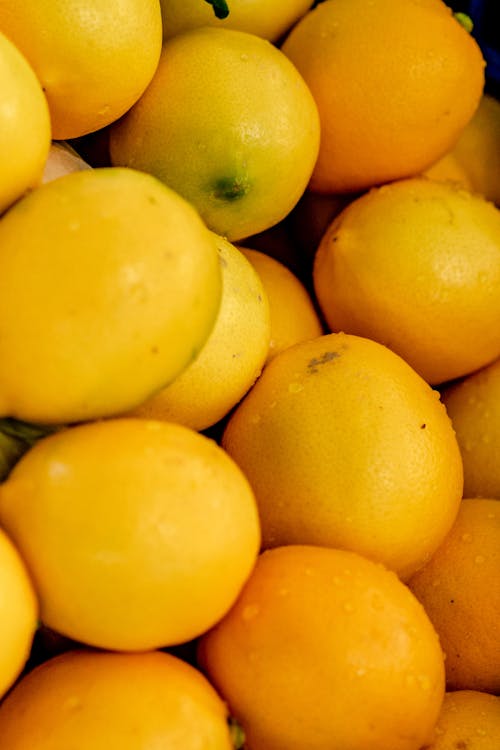 Yellow Citrus Fruits in Close Up Photography
