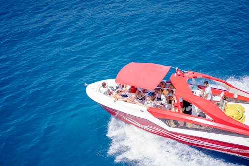 People Riding a Motorboat