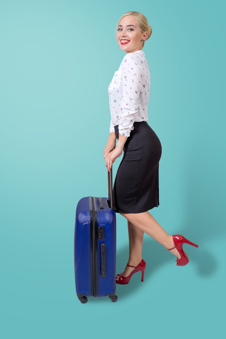 Portrait Of A Woman With A Luggage