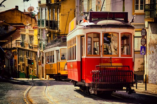 Historical Vintage Tram on Alfama district street in Lisbon city in Portugal