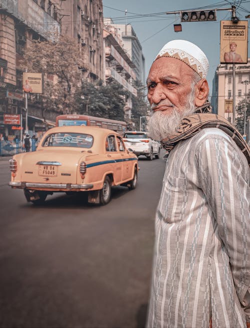 A Bearded Man Wearing White Cap