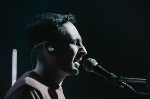 Side View of a Man Singing