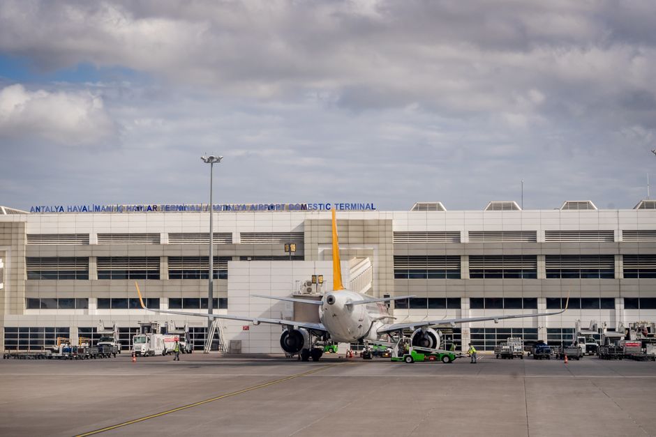 Exterior view of Podgorica Airport terminal in Montenegro with clear skies