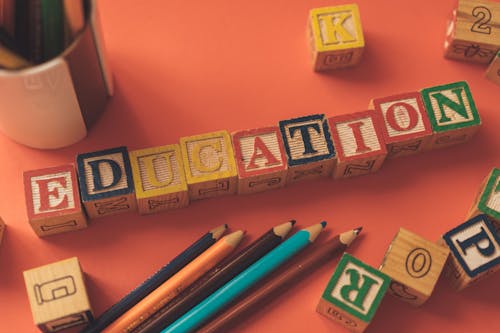 Education Sign out of Wooden Blocks