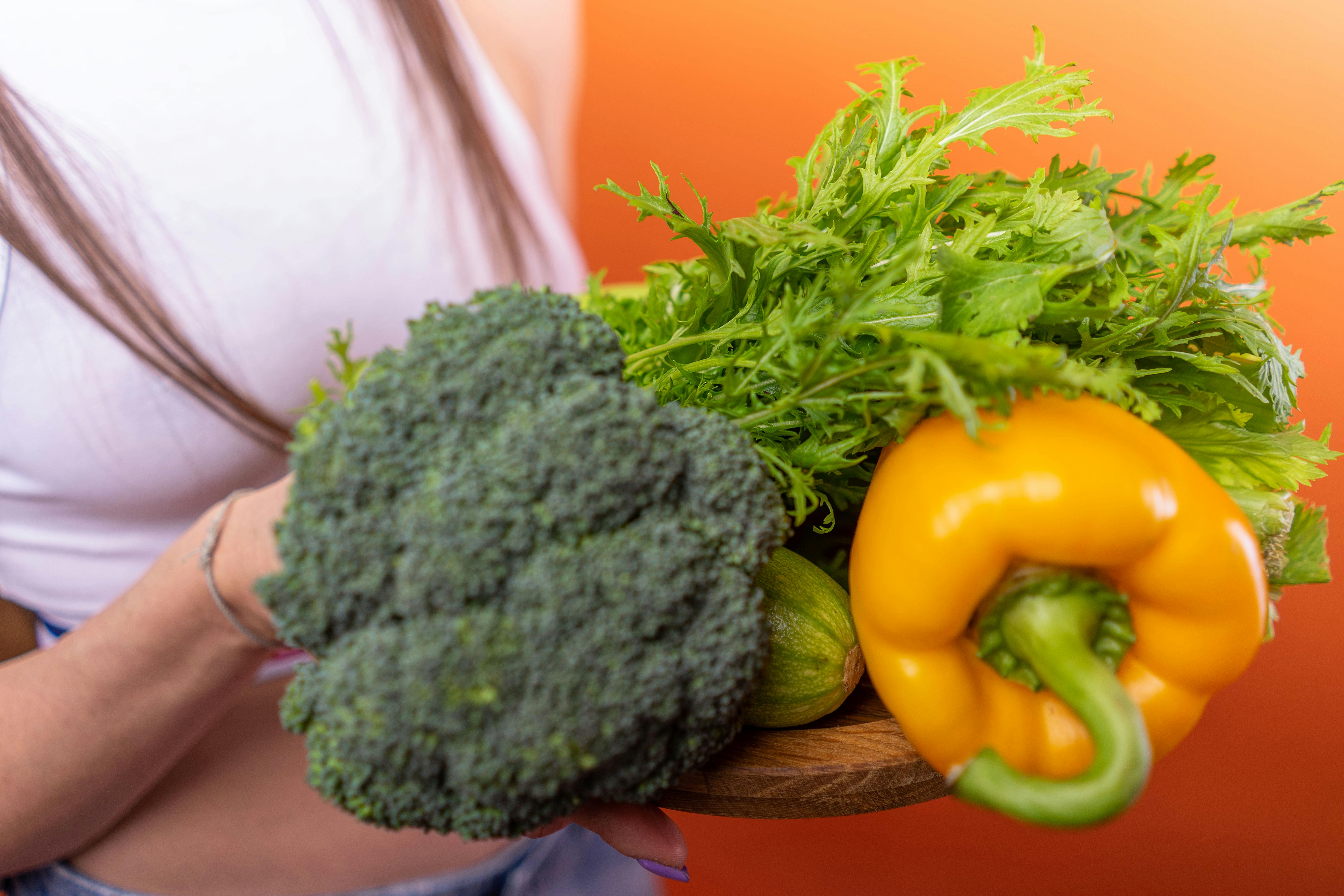 A vibrant medley of fresh vegetables including a yellow bell pepper and broccoli.