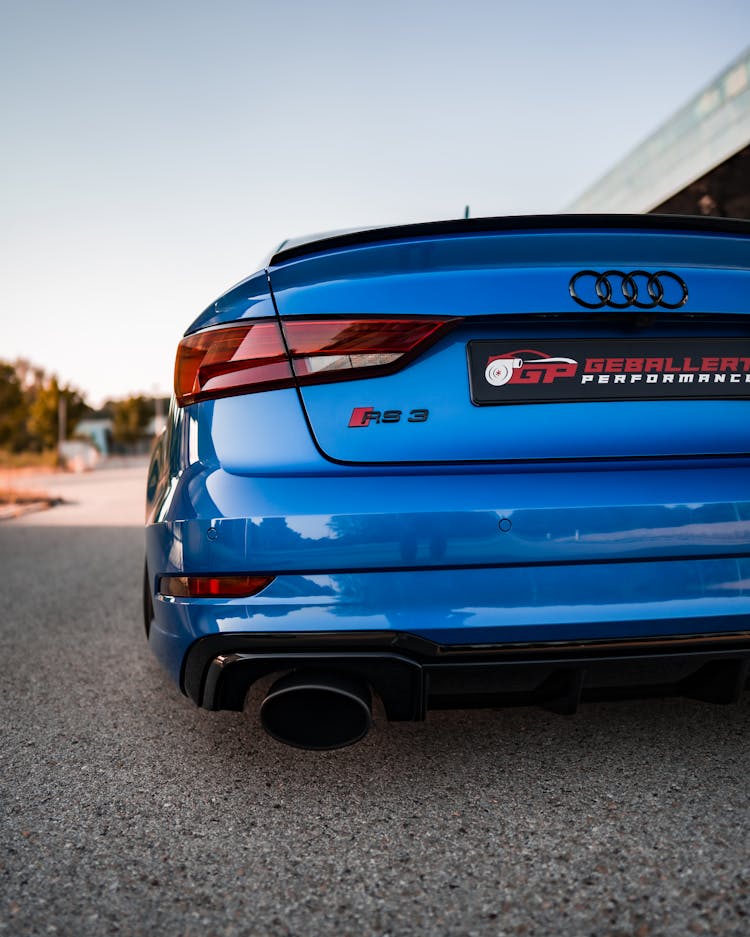 Close Up Photo Of A Blue Car