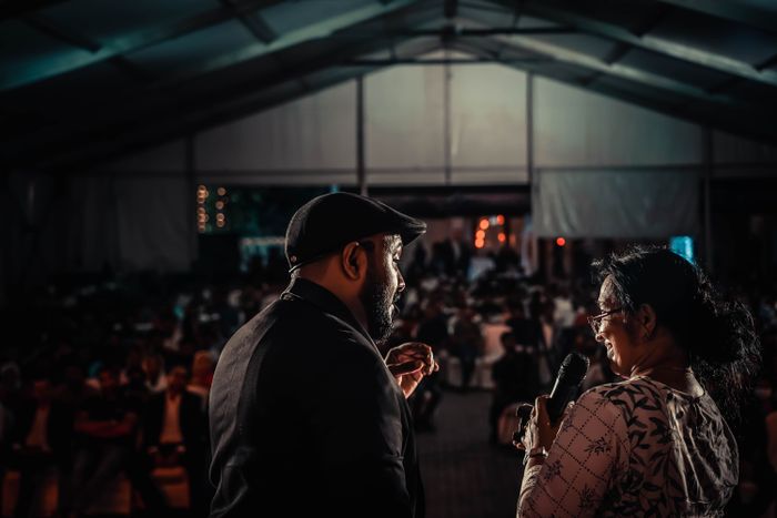 Performers on stage at an evening event — Nipin Niravath on Pexels