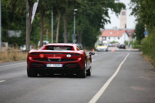 A Red Sports Car on the Road