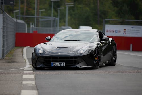 Free Black Ferrari on Road Stock Photo