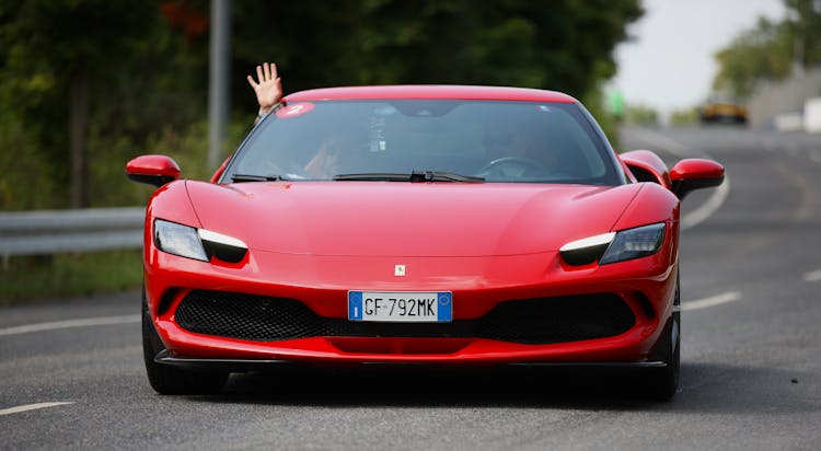 Red Ferrari On Road