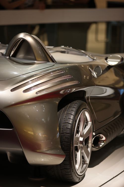 Free Close-up of a modern silver concept car showcasing sleek design and innovation. Stock Photo