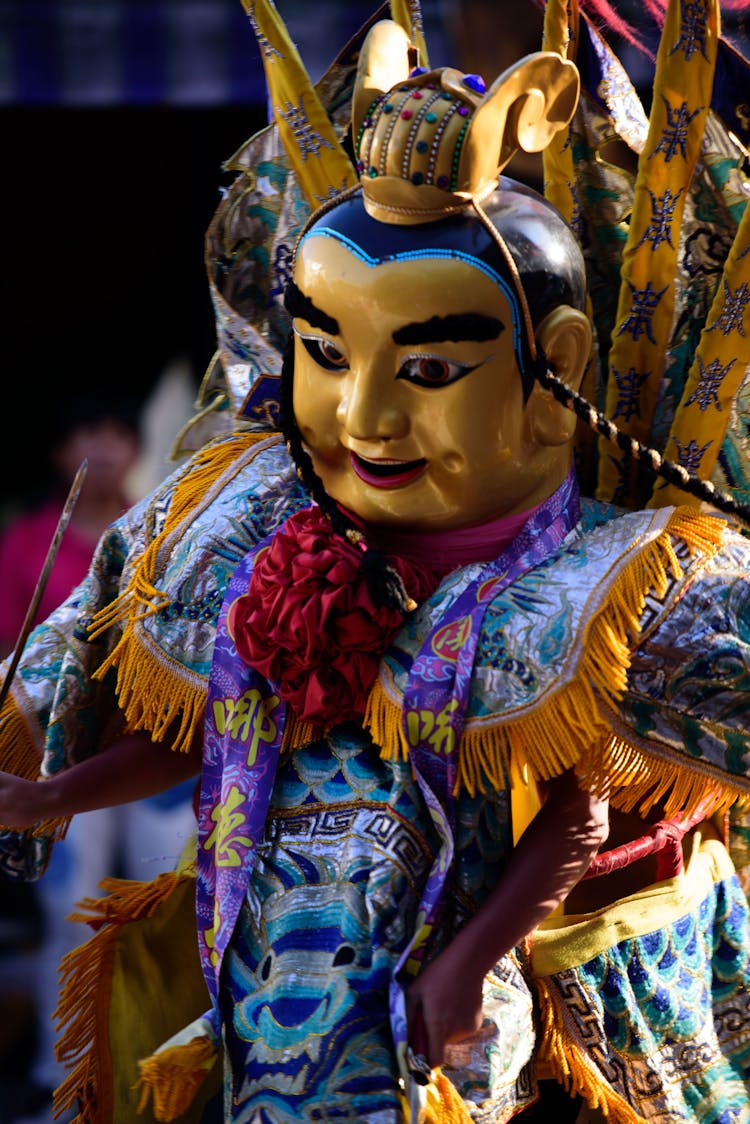 Dancer Wearing A Ritual Clothing And Mask