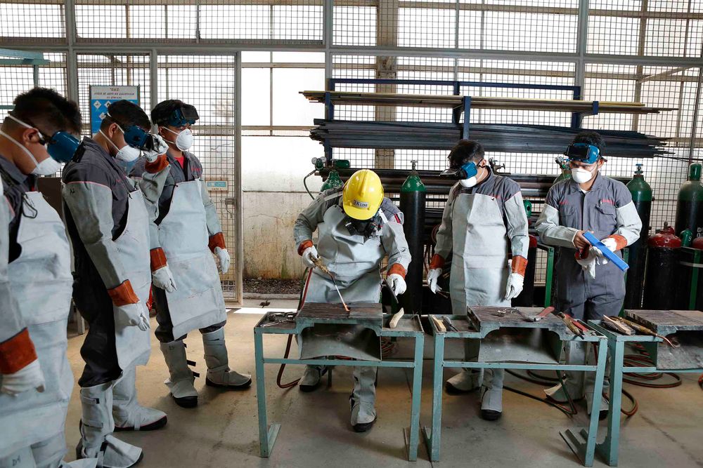 Workers participating in practical training in the Philippines