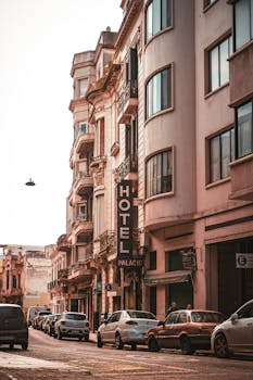 A picturesque urban street lined with classic architecture and parked cars in Uruguay.