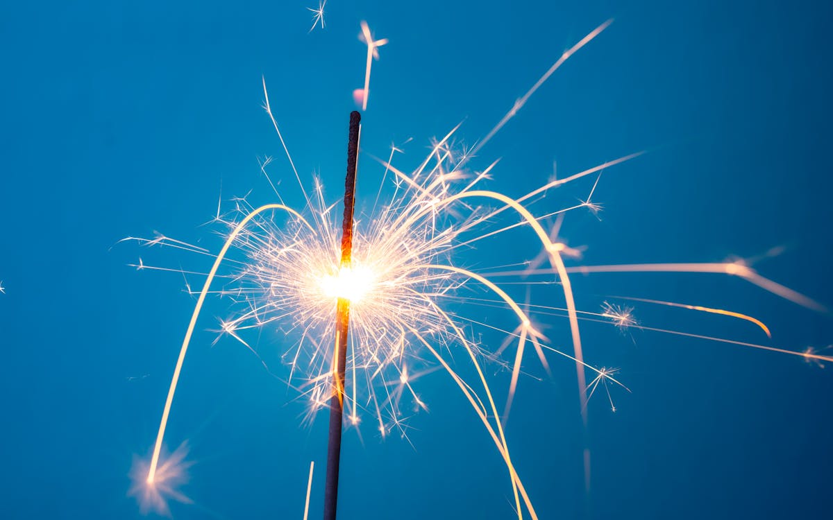 Free White and Yellow Fireworks in the Sky Stock Photo