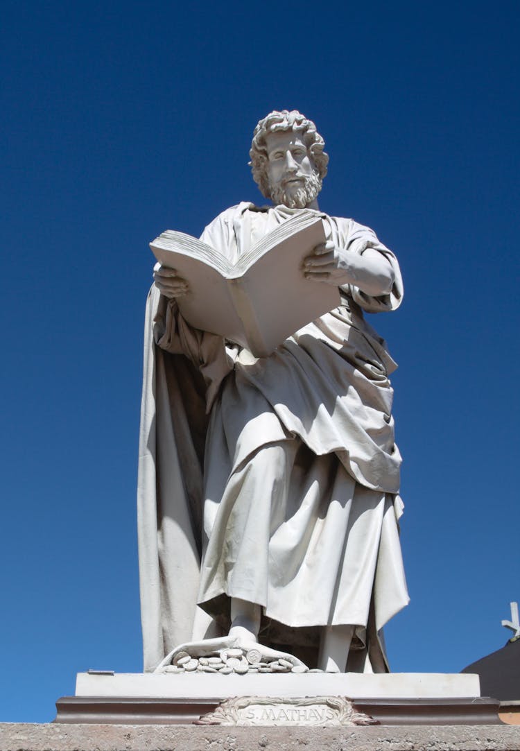 Marble Sculpture Of Man With Book