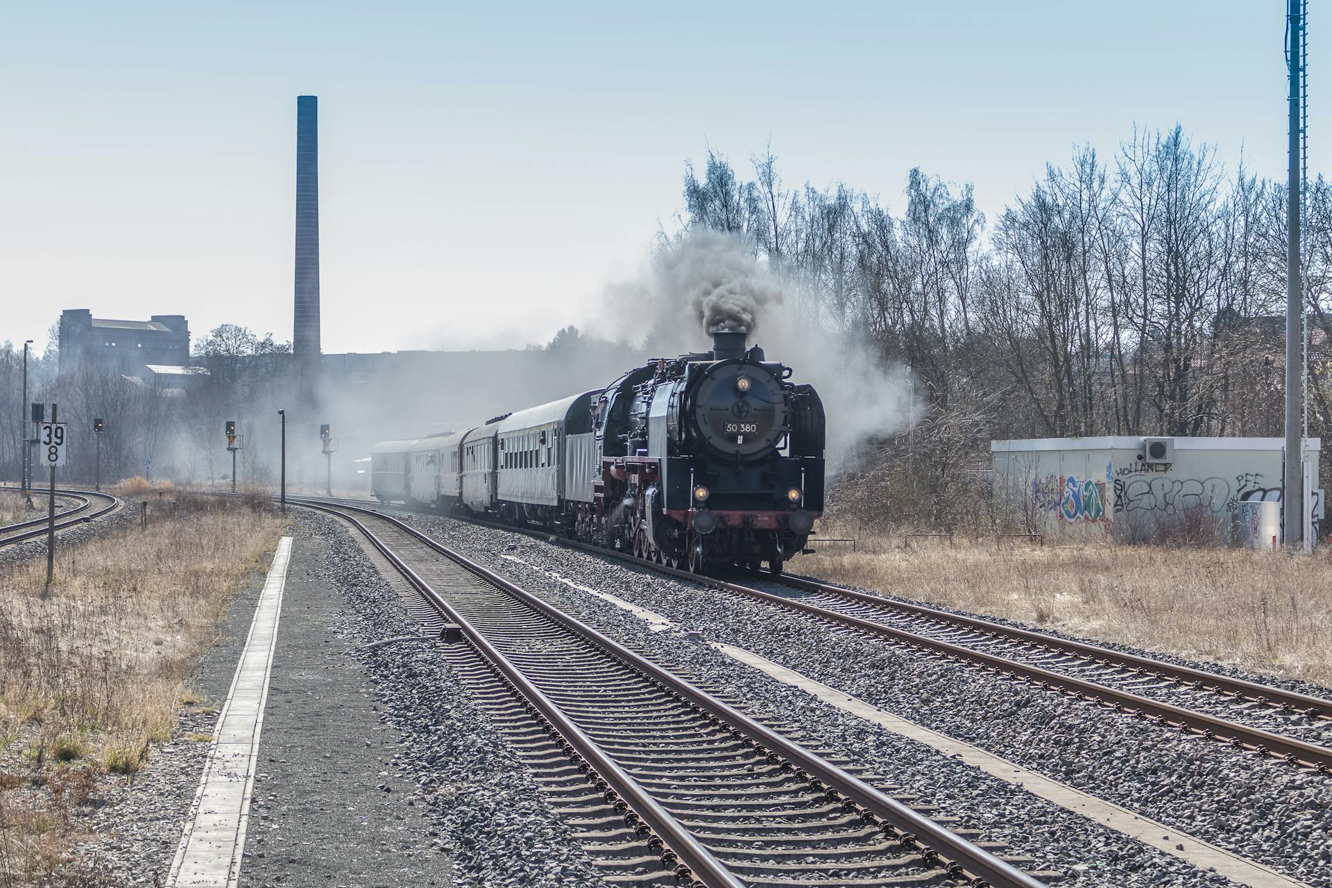 Steam Locomotive Emitting Grey Smoke