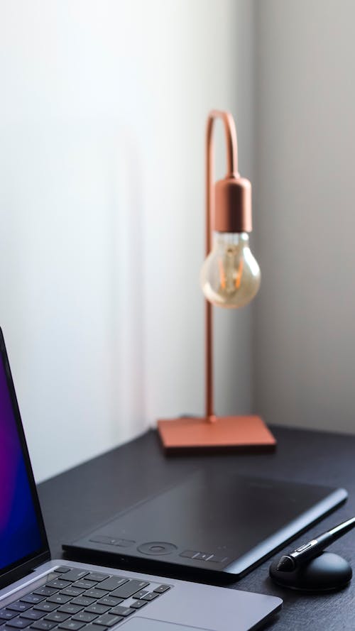 Lamp, Laptop and Tablet on Desk