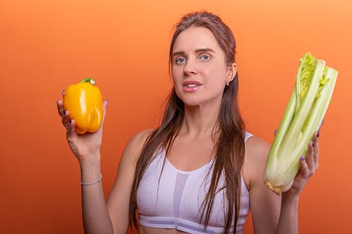 Woman Holding Vegetables