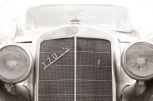 Grayscale Photo of Classic Car