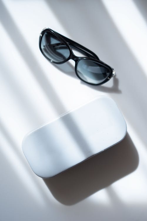 Sunglasses on a White Table 