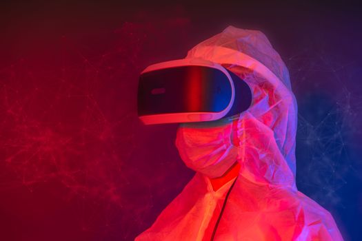 Individual in protective gear immersed in virtual reality under vibrant neon lighting.