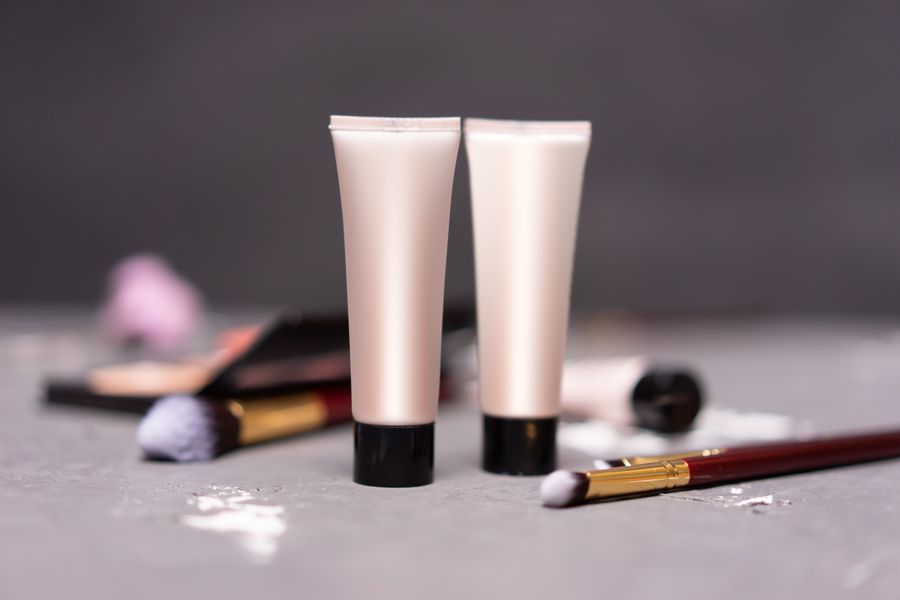 Illustrative summer makeup flat lay