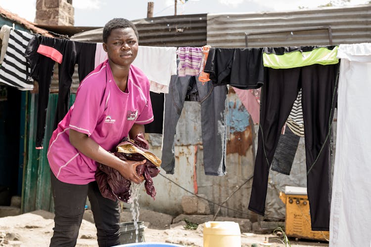 Girl Doing Laundry By Hand