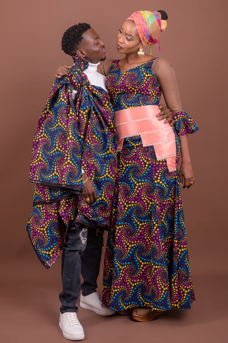 Couple In Traditional Clothes Posing In Studio