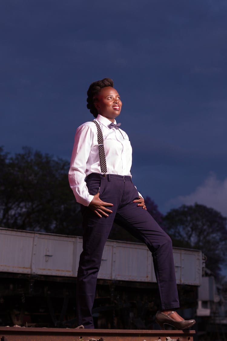 Woman Wearing Suspenders To Pants