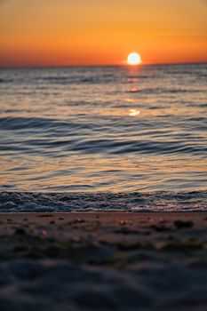 Captivating sunset over the Baltic Sea at Dierhagen beach, Germany. Serene coastal view.