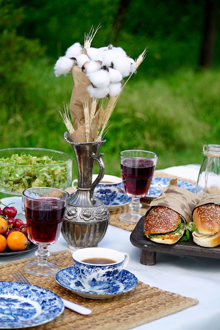 Food And Drinks On A Table Outdoors 