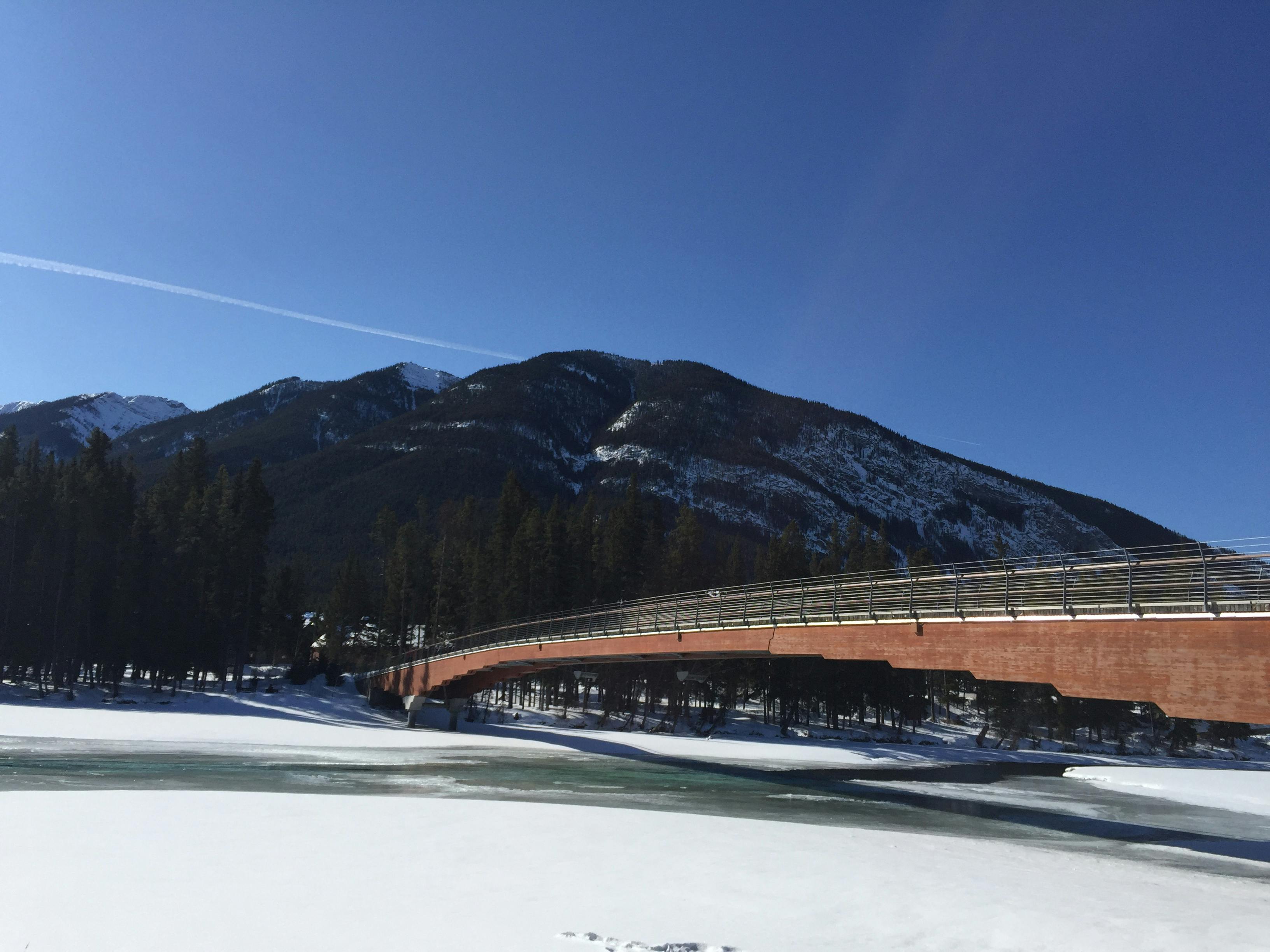 Free stock photo of blue sky, bridge, frozen river
