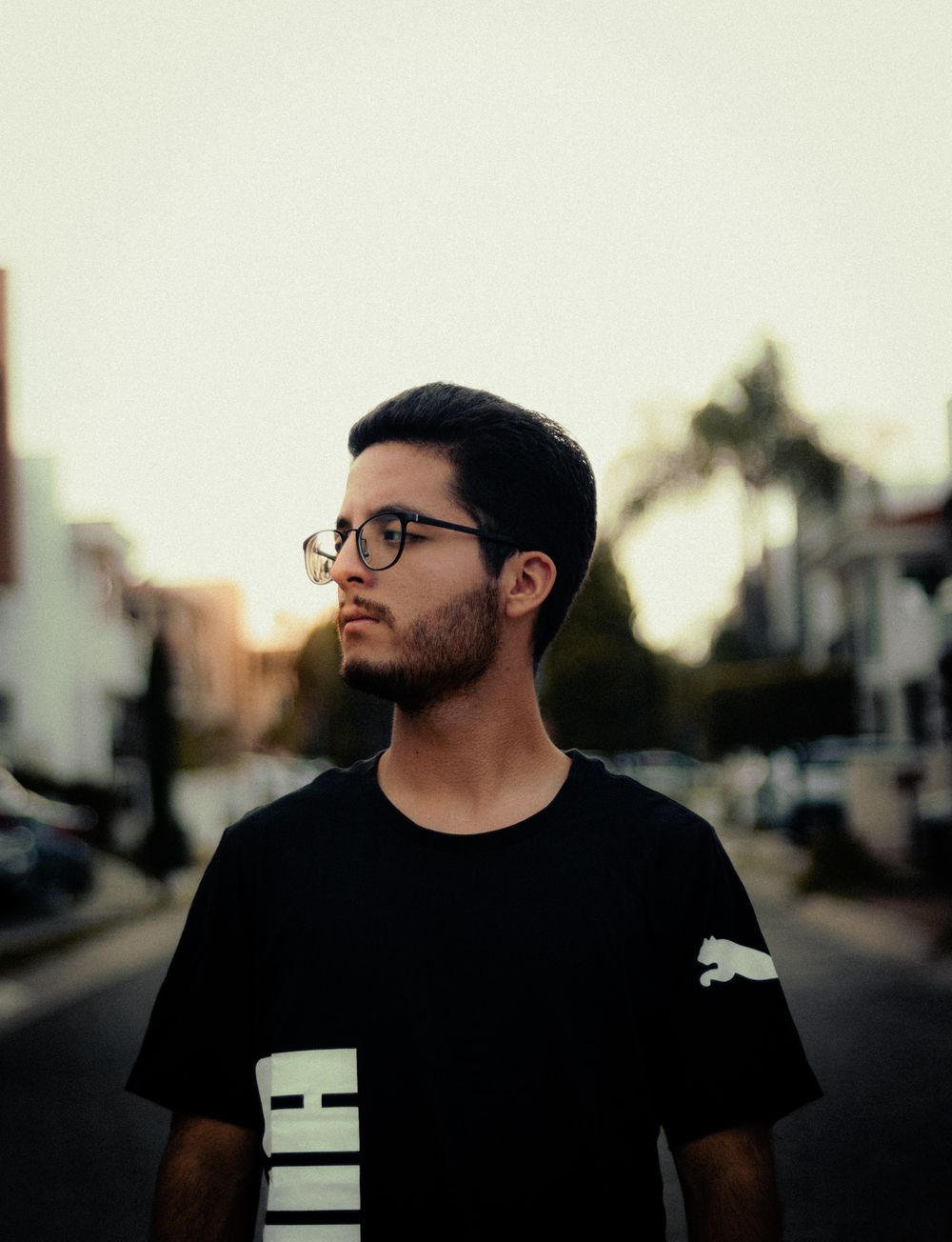 Man wearing the black Onyx Boxy crew-neck tee