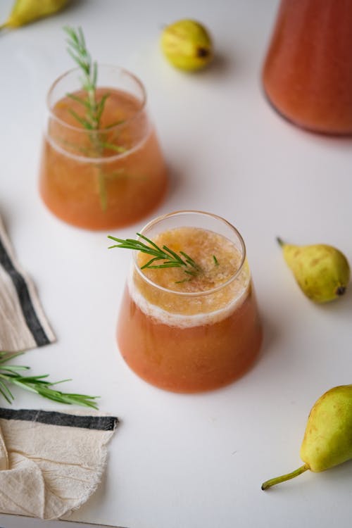 Juice in Glasses on a Table