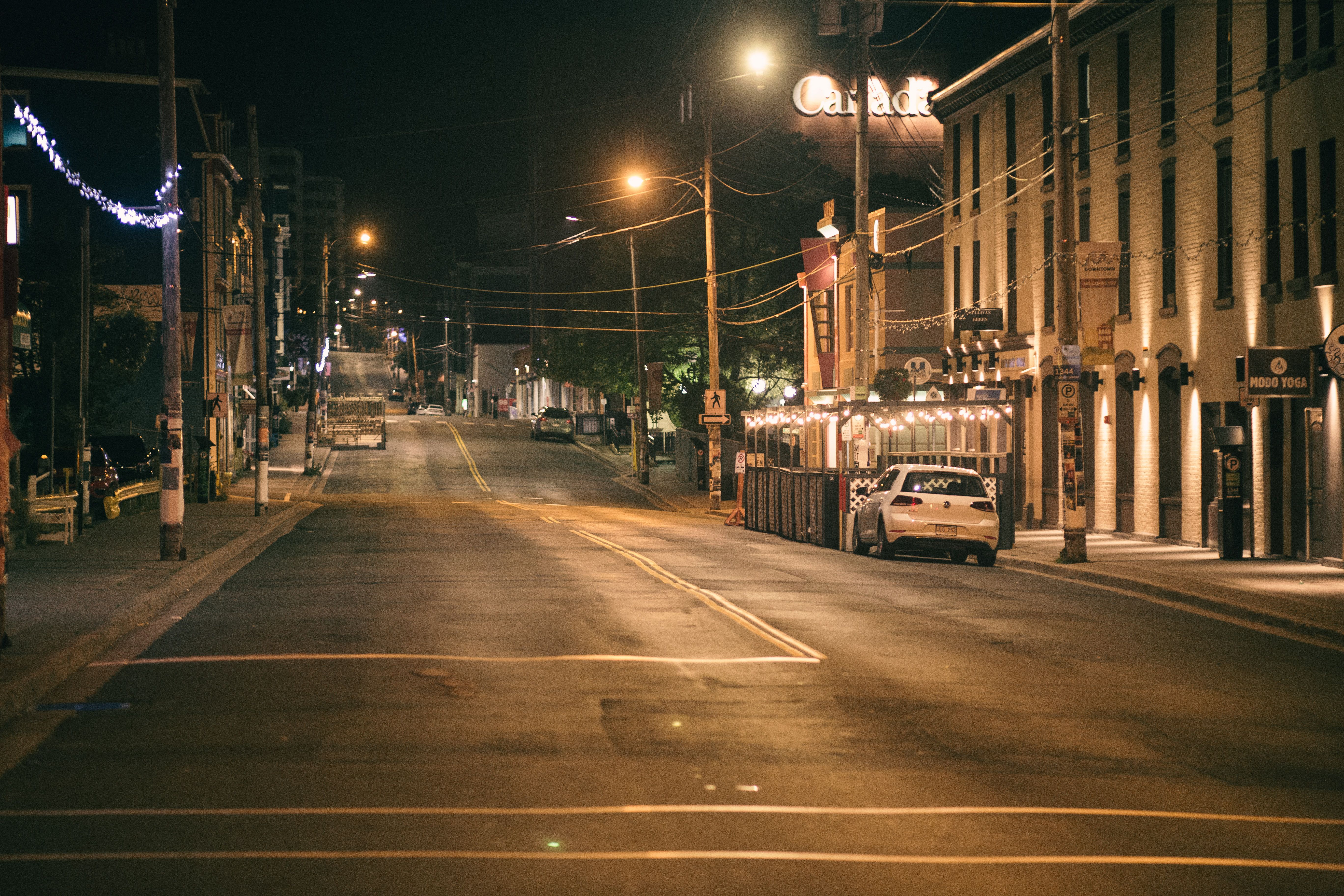 Well-lit downtown Springfield sidewalk in the evening