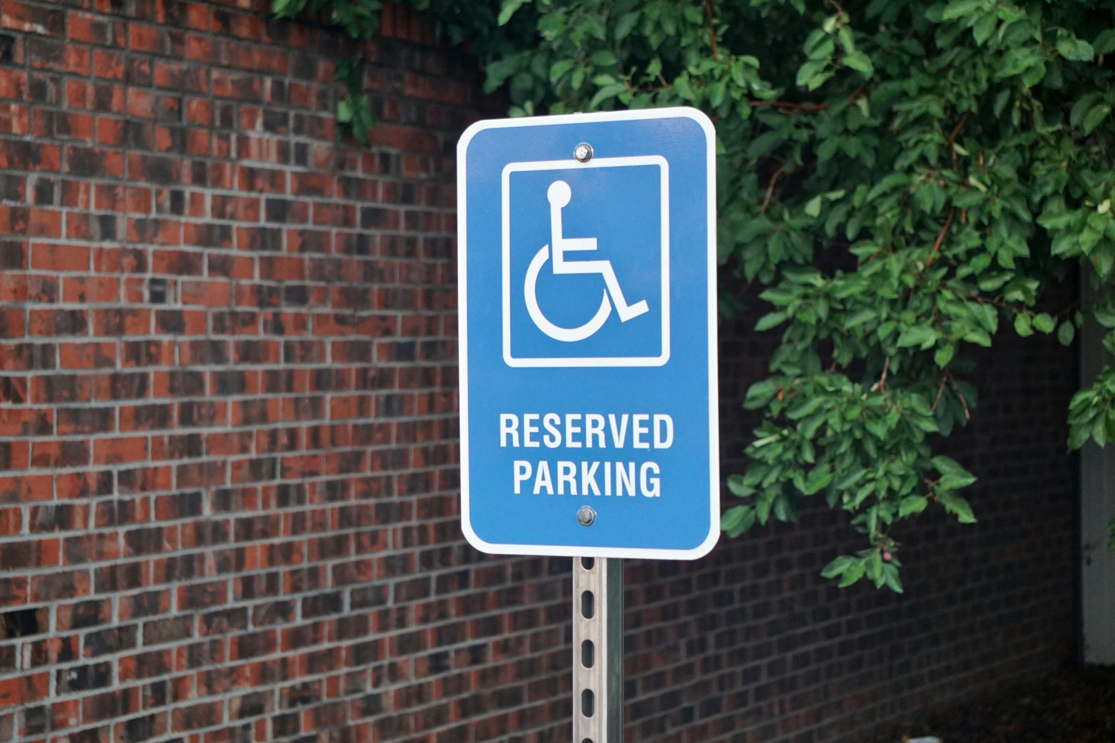 Reserved Parking Sign for PWD · Free Stock Photo