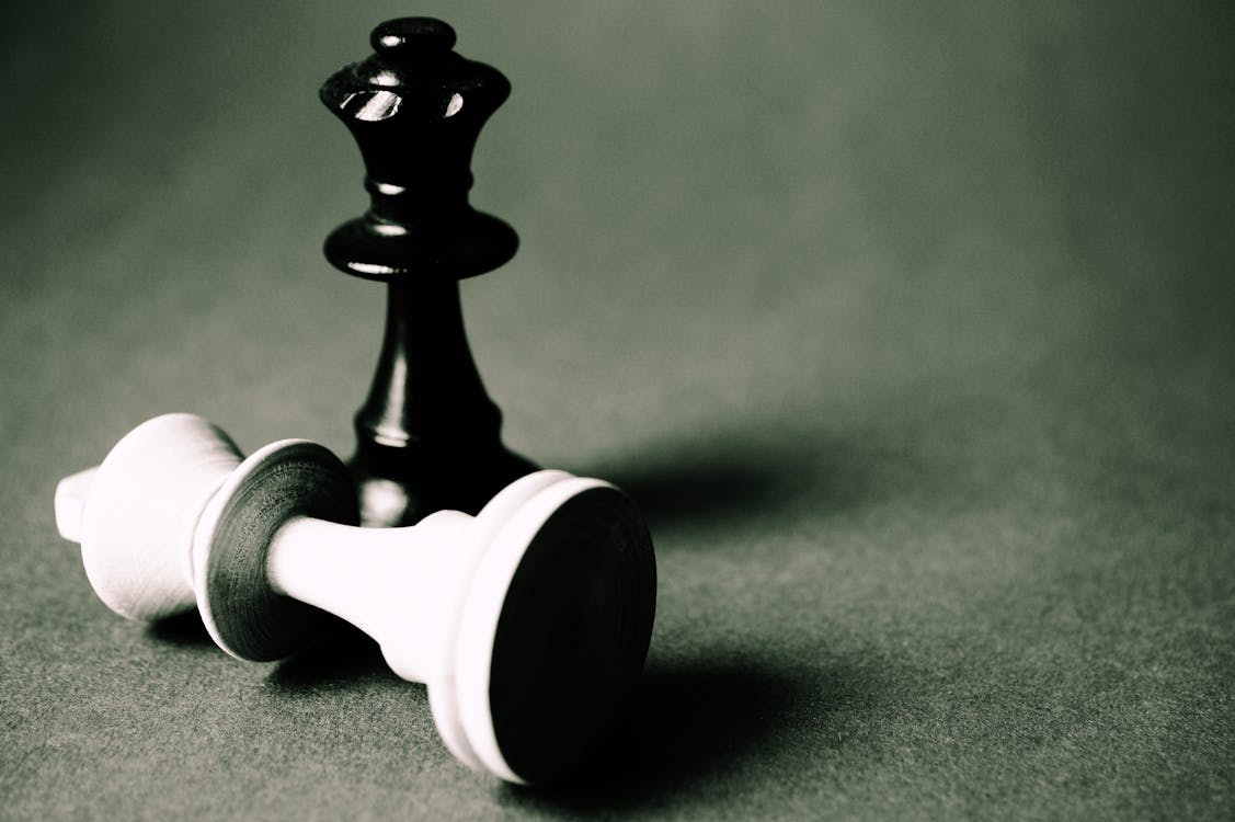 Free Black Queen Chess Piece Standing Stock Photo