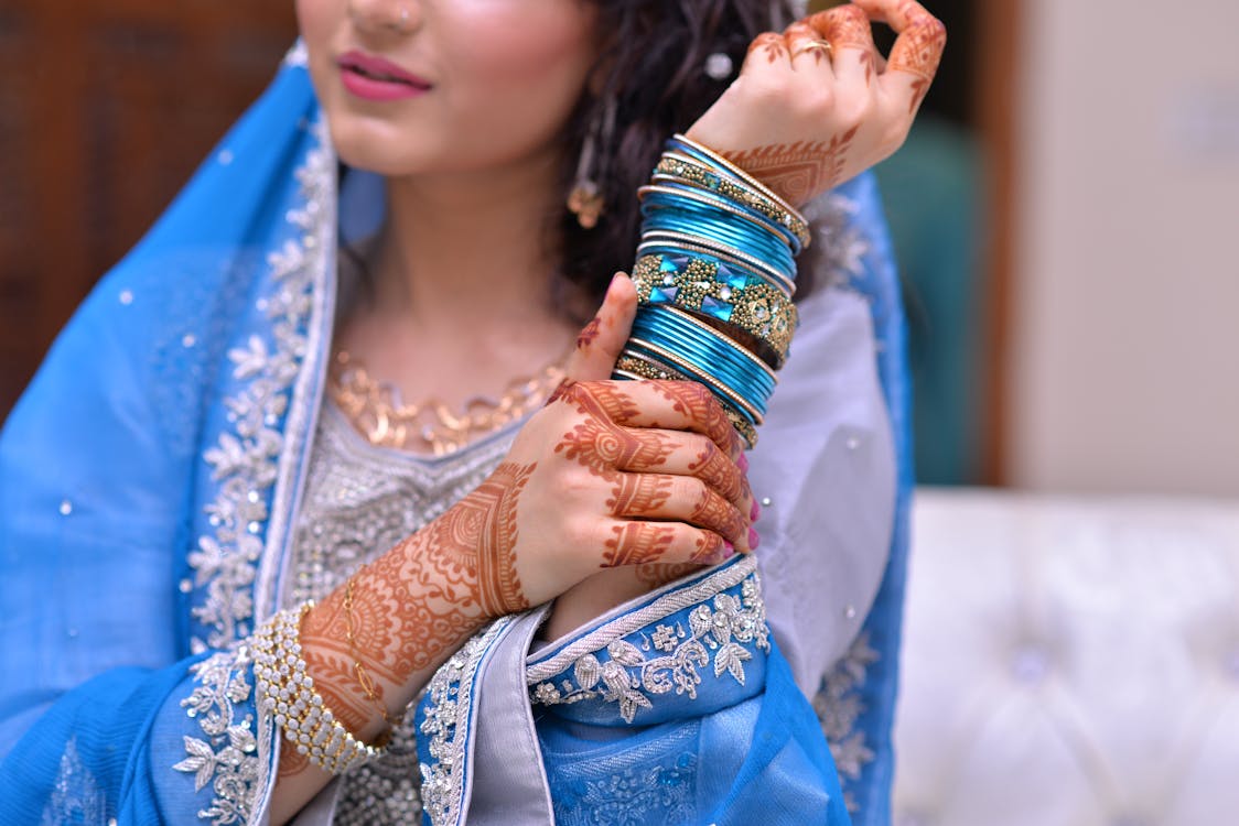 Free Woman Wearing Blue Traditional Indian Dress and Silk Thread Bangles Stock Photo