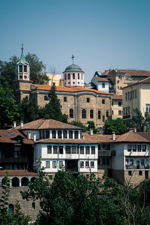 Free Charming view of traditional Veliko Tarnovo architecture with historic buildings and churches. Stock Photo