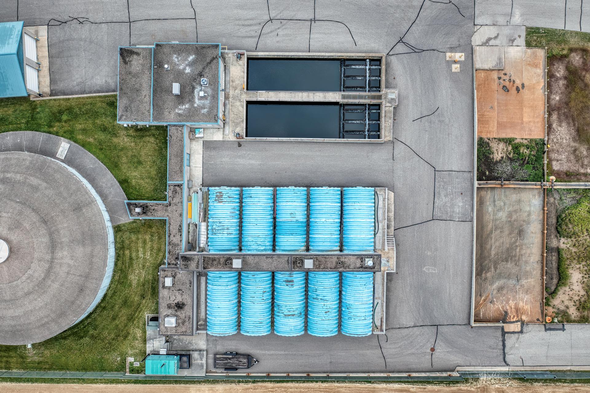 Drone shot of an industrial facility in Red Wing, MN featuring storage tanks and buildings.