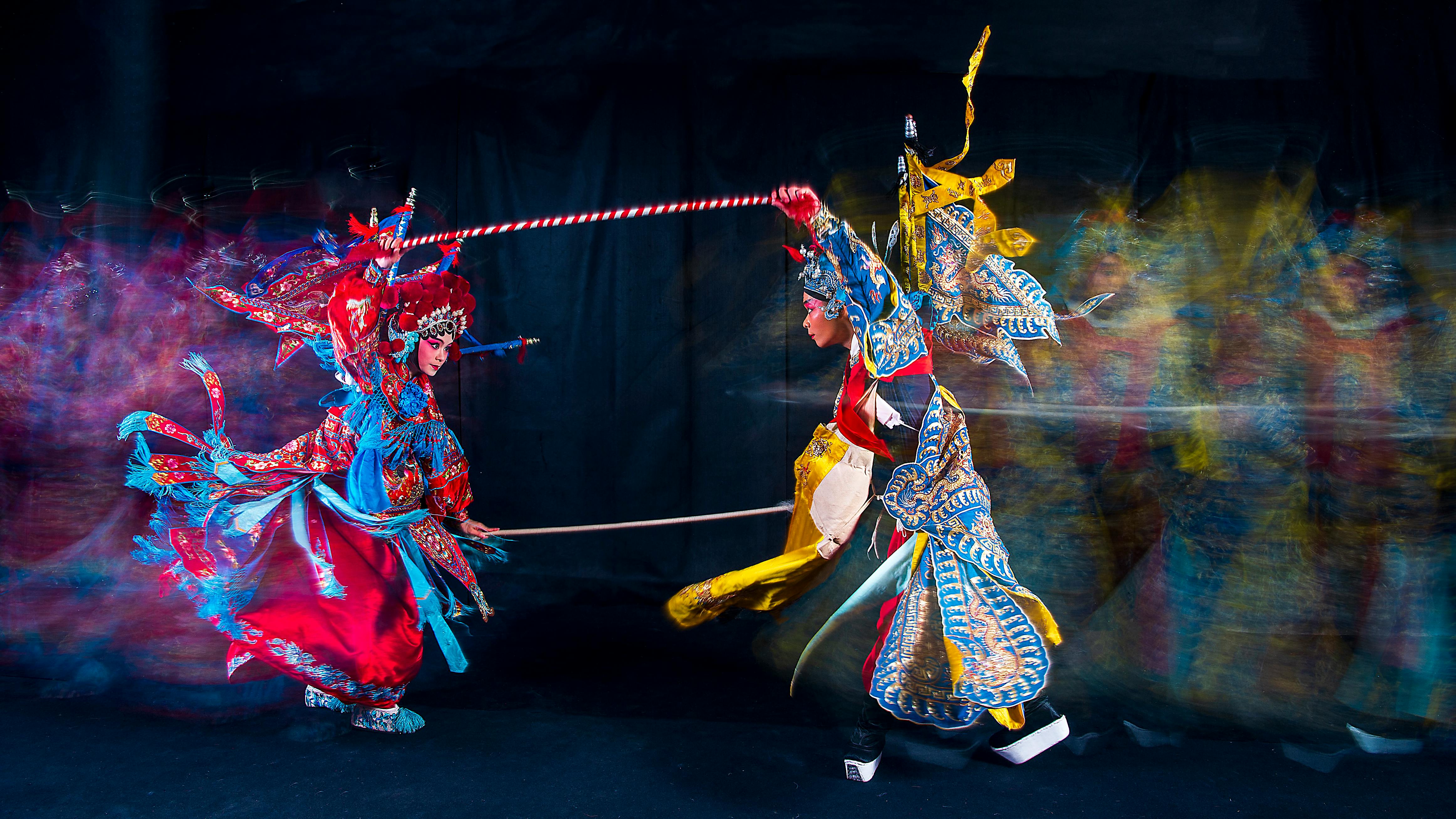 Man in a Traditional Chinese Costume Celebrating New Year
