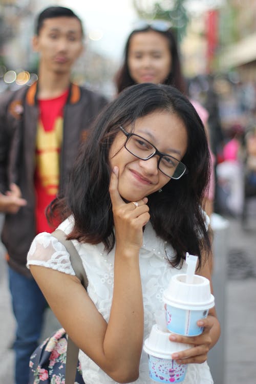 Free Close-Up Photography of Girl Wearing Eyeglasses Stock Photo