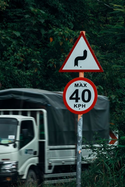 Road Signs on a Steel Post · Free Stock Photo