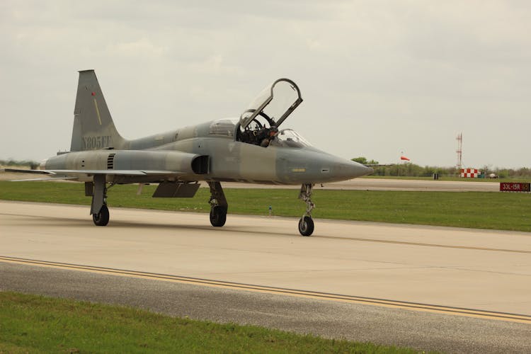 Military Jet On Airfield Tarmac