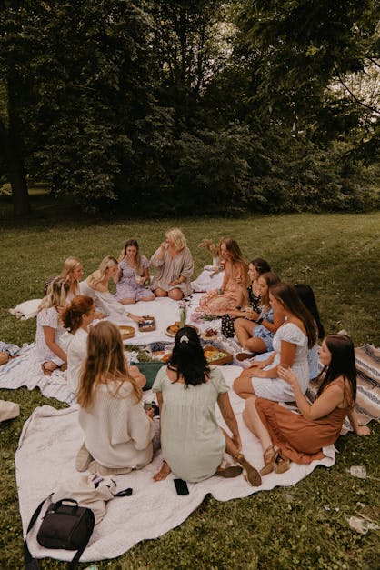 Friends hanging out, enjoying picnic - Stock Image - F020/2364 - Science  Photo Library