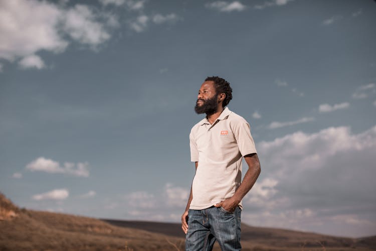 Bearded Man Wearing White Polo Shirt