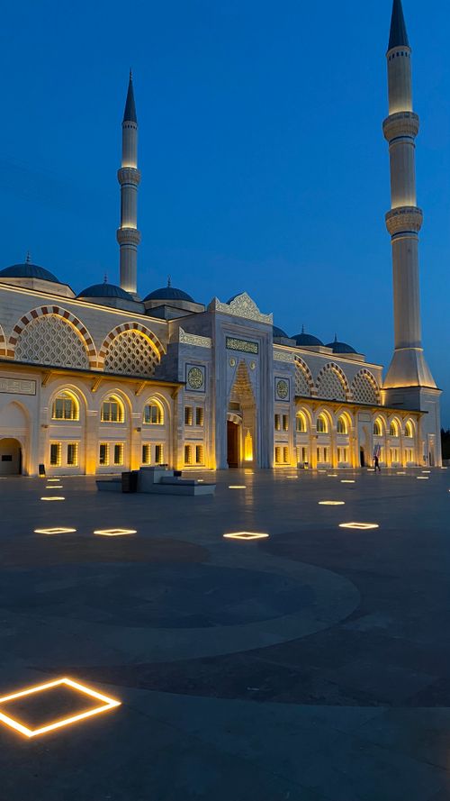 Free Stunning illuminated Çamlıca Mosque with a serene blue sky at dusk Stock Photo