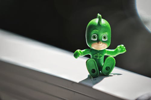 Green children's toy sitting